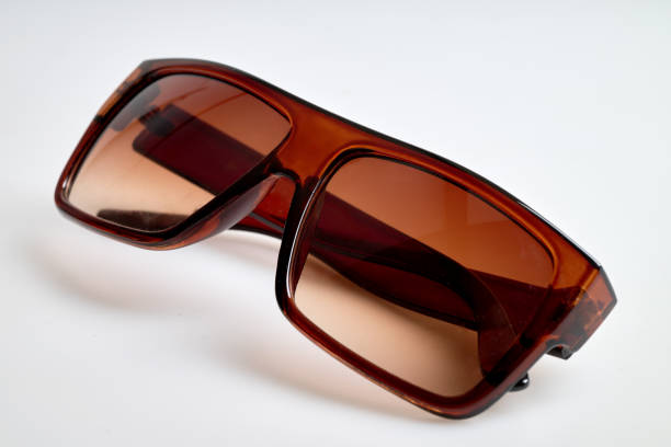Old and vintage Brown sunglasses on white background