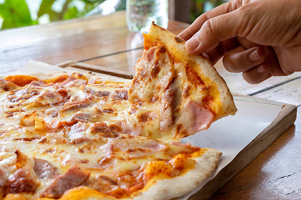 istock A ham and cheese pizza is commonly known as a 