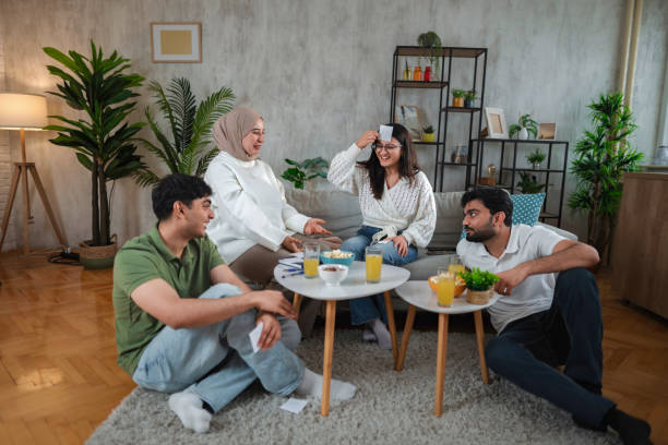 istock Diverse Friends Enjoying a Fun Game Night Together 2200556705