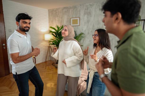 istock Multi-ethnic friends dancing and enjoying time together at home 2200556929