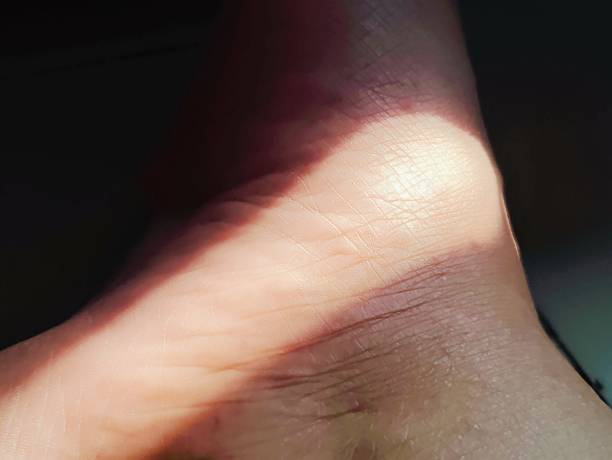 istock A close up of a human foot 's  skin texture with light effect 2200563294