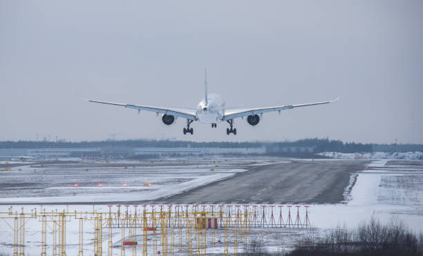 istock Airplane is landing on the runway 2200564264