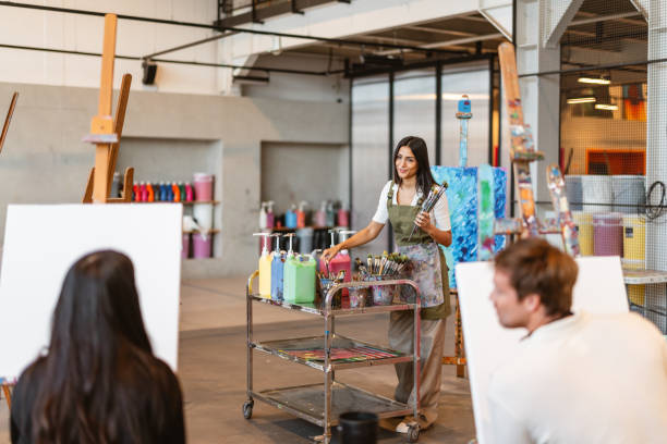 istock Middle Eastern Female Artist Teaching Diverse Art Class 2200566438