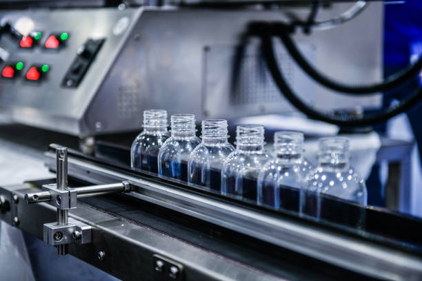 istock Clear plastic Bottles transfer on Automated conveyor systems industrial automation for package 2200568441