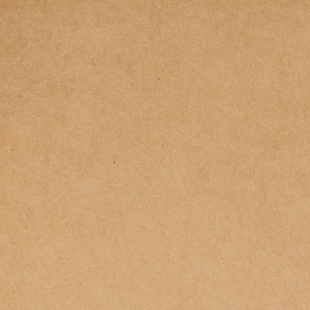 istock Cardboard sheet texture background, pattern of brown kraft paper with vintage style. 2200575144