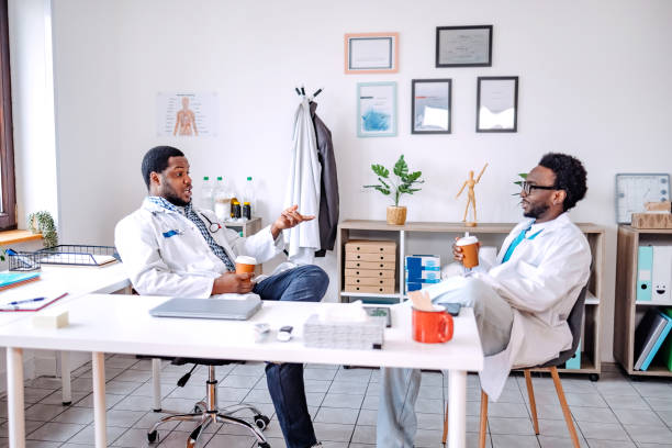 istock Colleagues working as doctors in private practice and taking a break talking and having coffee 2200576255