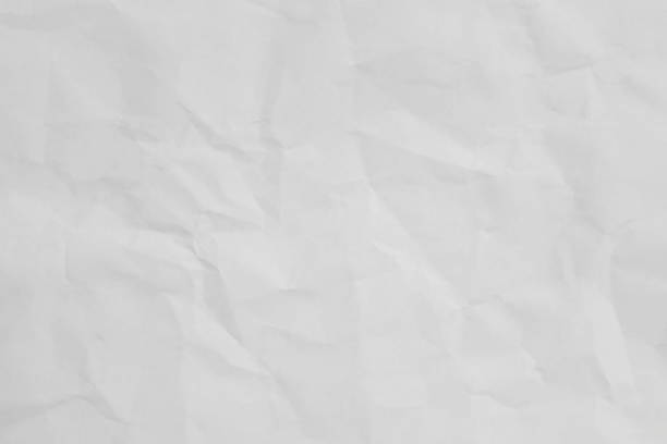 istock White recycled craft paper texture as background with copy space. 2200577705