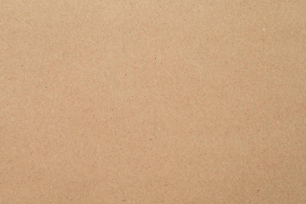 istock Cardboard sheet texture background, pattern of brown craft paper with vintage style. 2200577790