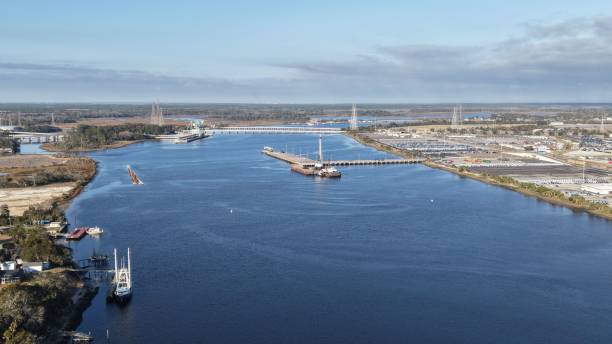 istock View of a river port with docked ships and industrial facilities under a clear sky 2200581775