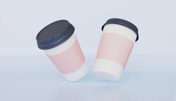 istock Two disposable paper coffee cup with a black lid 2200583623