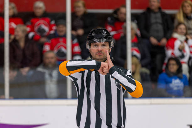 istock Focused Caucasian Male Referee During Ice Hockey Game 2200585926
