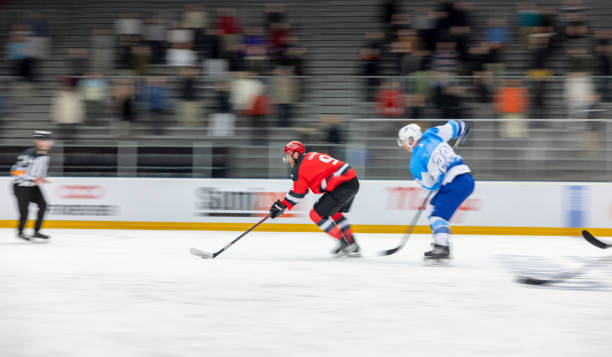 istock Action-Packed Ice Hockey Match With Dynamic Players 2200586128
