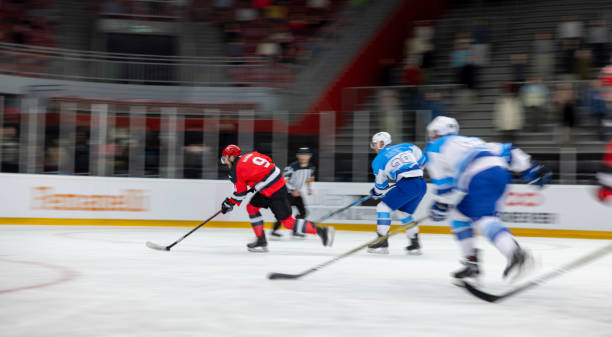 istock Motion Blur Hockey Players Competing During Professional Ice Game Match 2200586130