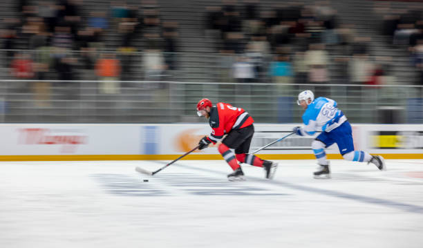 istock Intense Ice Hockey Match With Players in Motion 2200586142