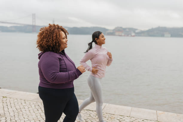 istock Women Running Along a Coastal Path Together 2200587059