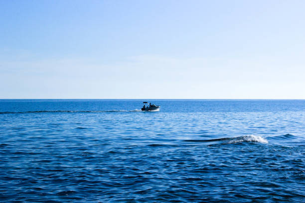 istock boat ride on the sea on a sunny day 2200587605