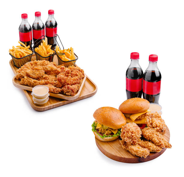 Delicious fried chicken meal with burgers and drinks for sharing