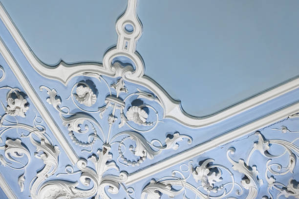 istock Ornate white sculptural plaster molding featuring intricate corner designs 2200589326