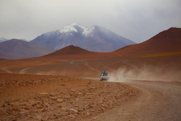 istock Off road vehicle on dusty desert dirty ways 2200590570