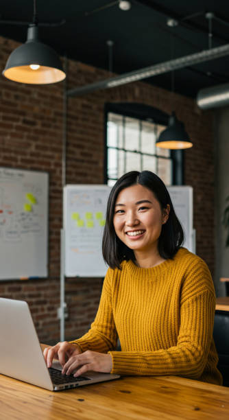 istock Young Asian Woman in a Startup Environment 2200591585