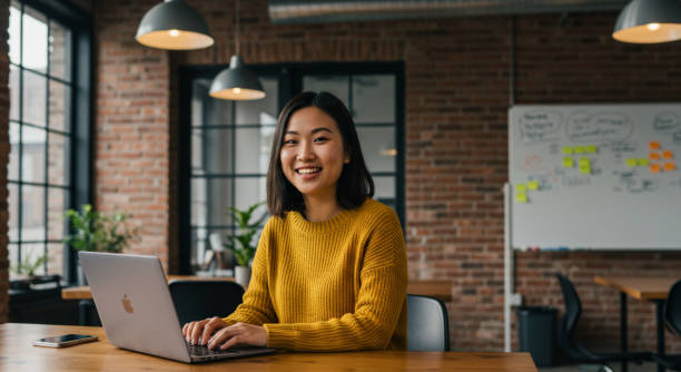 istock Young Asian Woman in a Startup Environment 2200591634