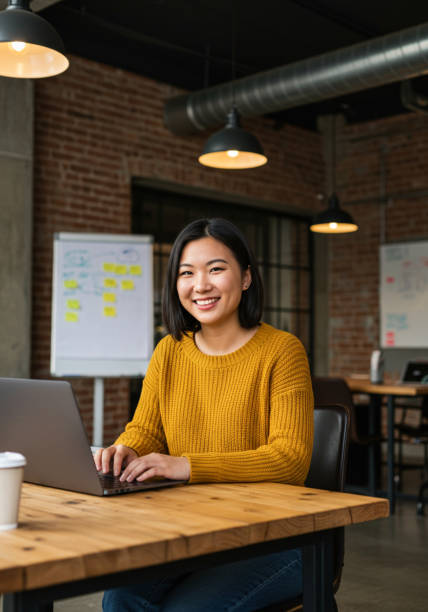 istock Young Asian Woman in a Startup Environment 2200591685