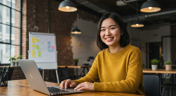 istock Young Asian Woman in a Startup Environment 2200591705