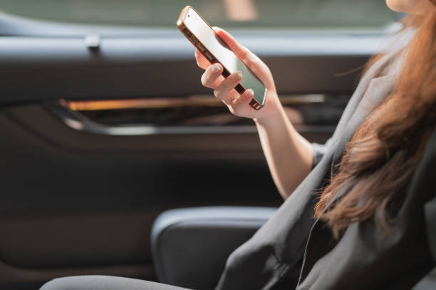 istock Asian young Chinese female using phone reply client inside public transport vehicle stock photo 2200599211