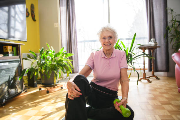 istock Portrait of nice senior training at home 2200601229