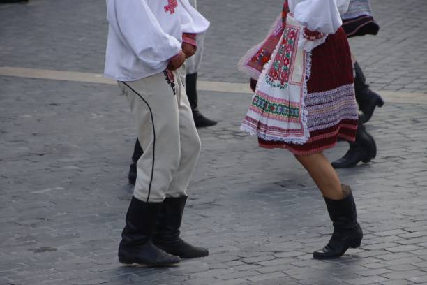 istock Slovak folk dancers in traditional attire 2200601426