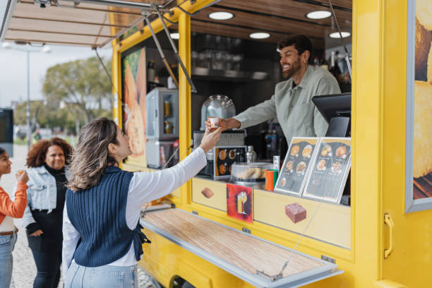 istock Delighted Customer at Food Truck Service 2200604413