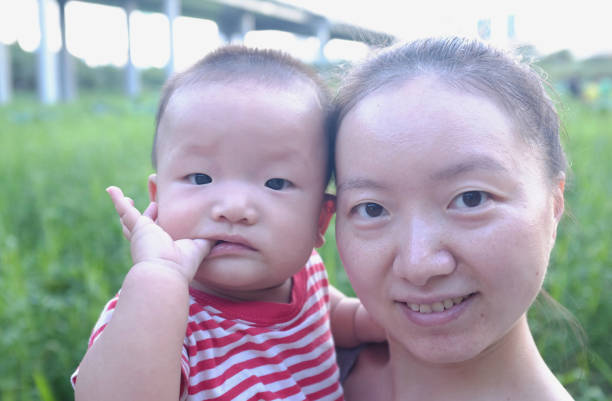 Happy Asian mother and son