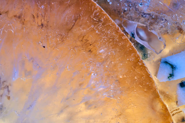 Agate macro detail. close-up of a textured semi-precious gemstone background. backlight transparency