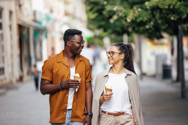 istock Adult man, talking to his girlfriend, during their walk. 2200608030
