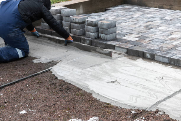istock Professional Paver Installing Concrete Bricks for an Outdoor Pathway 2200609398
