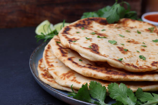 istock Garlic Naan Bread an Indian Cuisine side dish 2200611054