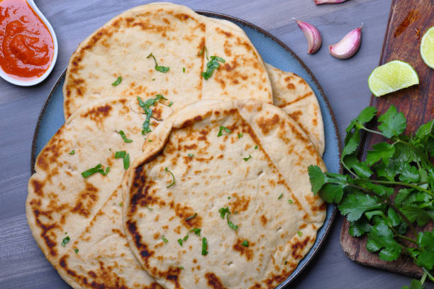 istock Garlic Naan Bread an Indian Cuisine side dish 2200611082