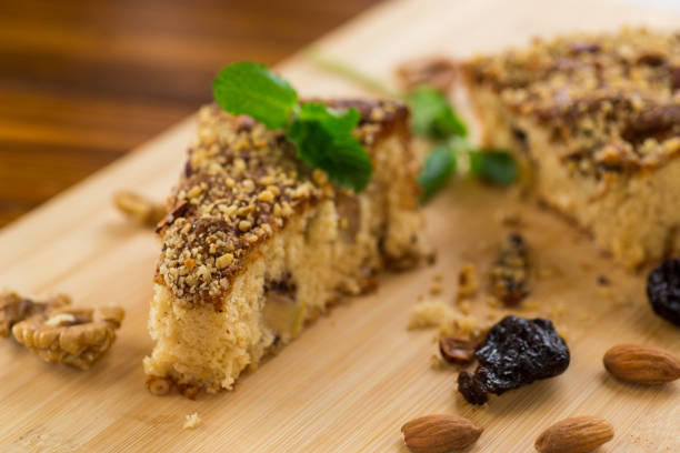 Homemade sponge cake with nuts and prunes.
