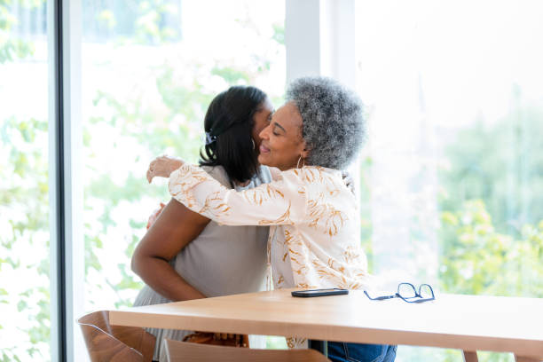 istock Warm Embrace: Multiracial Women Bonding and Sharing Happiness 2200614482