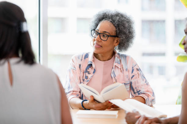 African American Woman Leads Group Therapy Session
