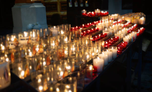 istock Burning candles on altar in church. 2200621734
