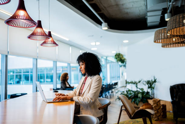 istock Businesswoman using laptop working at office 2200623925