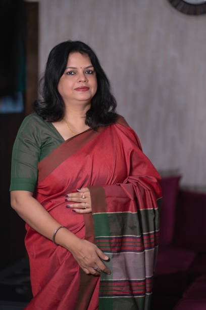 istock Confident Indian Lady in a Classic Saree Pose 2200626551