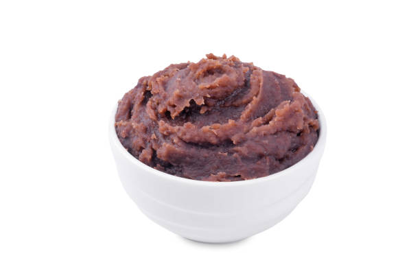 istock Sweet red bean paste, anko in a bowl on a white isolated background 2200626813