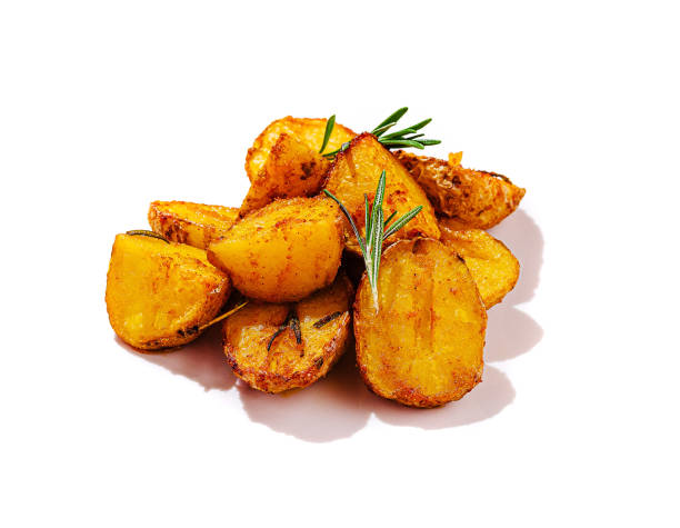 istock Crispy roasted potatoes garnished with fresh herbs on a vibrant purple background 2200627990
