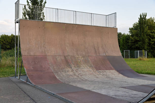 istock Skate park with different halfpipes in summer 2200632445