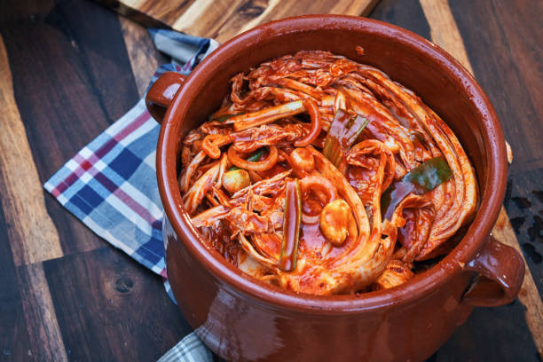 istock Fermented Foods - Preparing Kimchi with Red Pepper Paste 2200632527