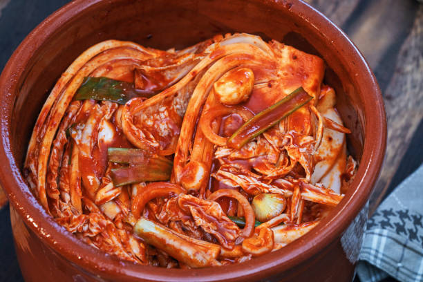 istock Fermented Foods - Preparing Kimchi with Red Pepper Paste 2200632547
