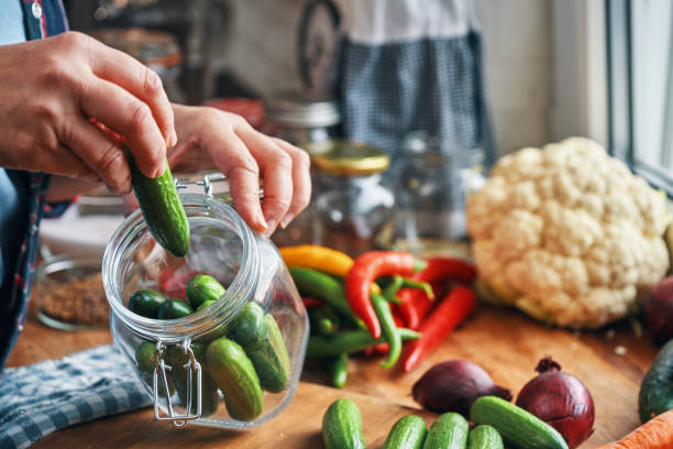 istock Fermented Foods - Preparing Fermented Cucumbers with Spices 2200633874