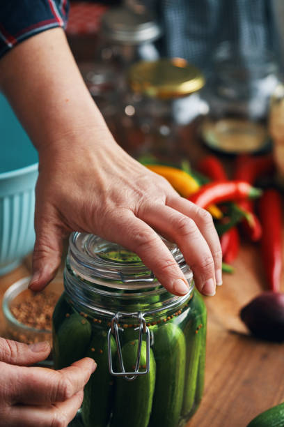 istock Fermented Foods - Preparing Fermented Cucumbers with Spices 2200634022